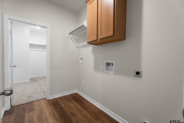 washroom with cabinets, washer hookup, dark hardwood / wood-style flooring, and hookup for an electric dryer