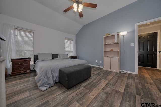 bedroom featuring lofted ceiling, ceiling fan, baseboards, and dark wood finished floors