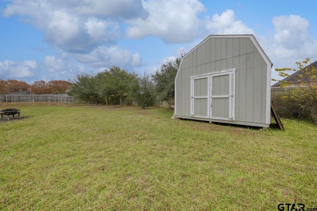 view of shed featuring a fenced backyard