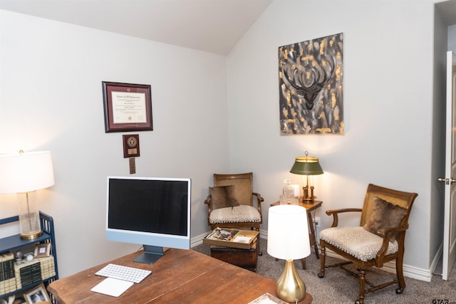 office area featuring vaulted ceiling and carpet