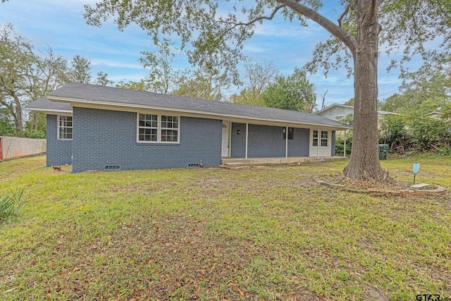 single story home featuring a front yard