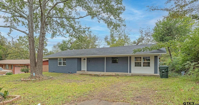 ranch-style house with a front lawn