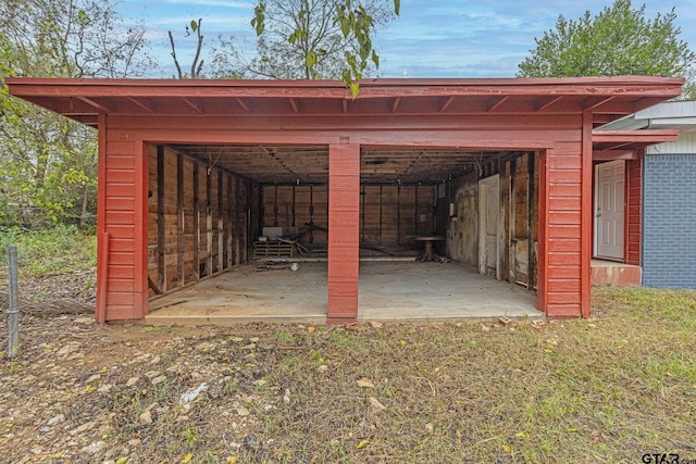 view of outbuilding with a yard