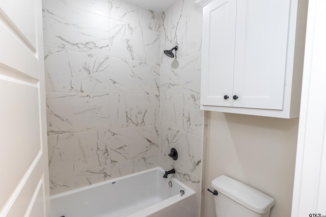 bathroom featuring toilet and washtub / shower combination