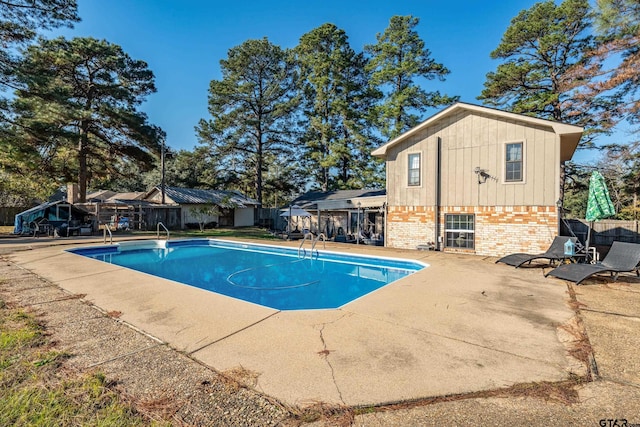 view of pool with a patio area