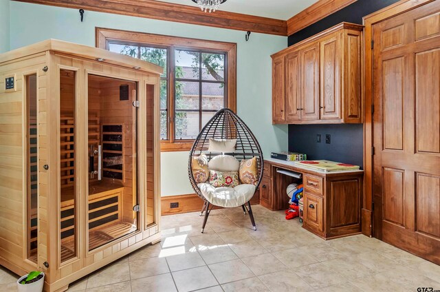 tiled home office with built in desk and crown molding