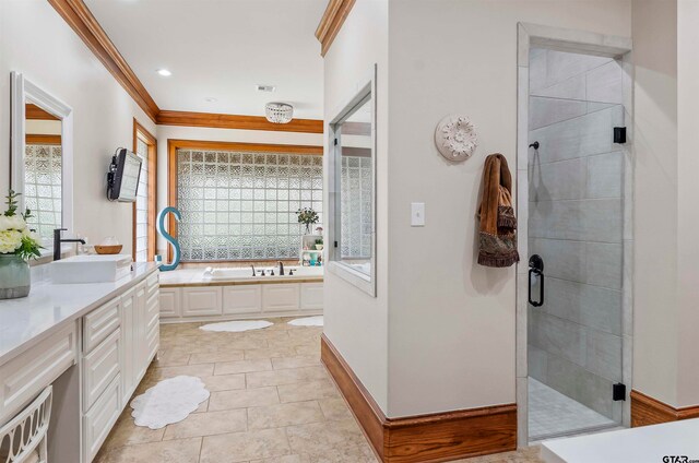 bathroom with vanity, tile patterned flooring, plus walk in shower, and ornamental molding