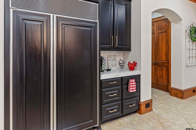 kitchen with light tile patterned floors