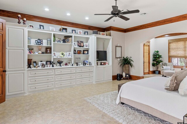 tiled bedroom featuring ceiling fan and ornamental molding