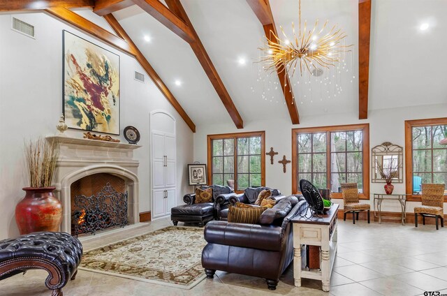 living room featuring beamed ceiling, high vaulted ceiling, and an inviting chandelier