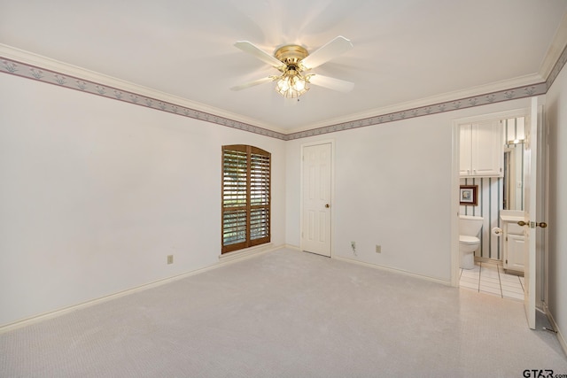 1807 Royal Oak Dr, Tyler, TX 75703 - spare room featuring a ceiling fan, ornamental molding, and light carpet