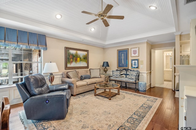 1807 Royal Oak Dr, Tyler, TX 75703 - living area with ceiling fan, a raised ceiling, hardwood / wood-style floors, recessed lighting, and crown molding