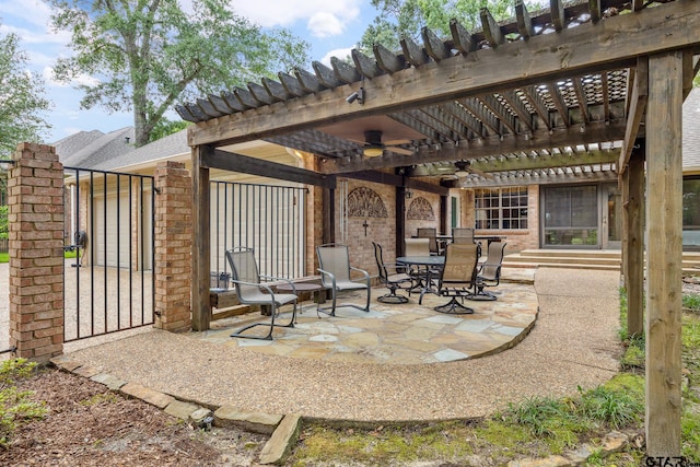 1807 Royal Oak Dr, Tyler, TX 75703 - view of patio featuring a pergola, a ceiling fan, outdoor dining area, and a gate