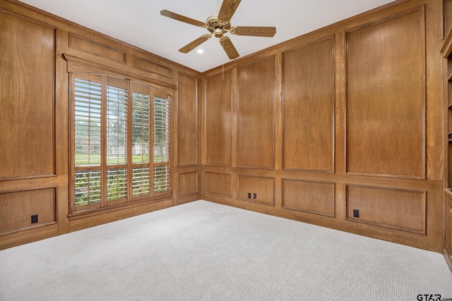 1807 Royal Oak Dr, Tyler, TX 75703 - carpeted spare room with a decorative wall and a ceiling fan