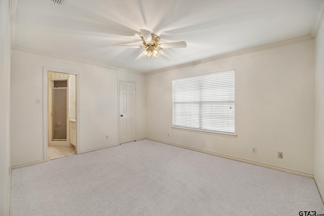 1807 Royal Oak Dr, Tyler, TX 75703 - unfurnished bedroom featuring carpet flooring, crown molding, ensuite bathroom, and ceiling fan