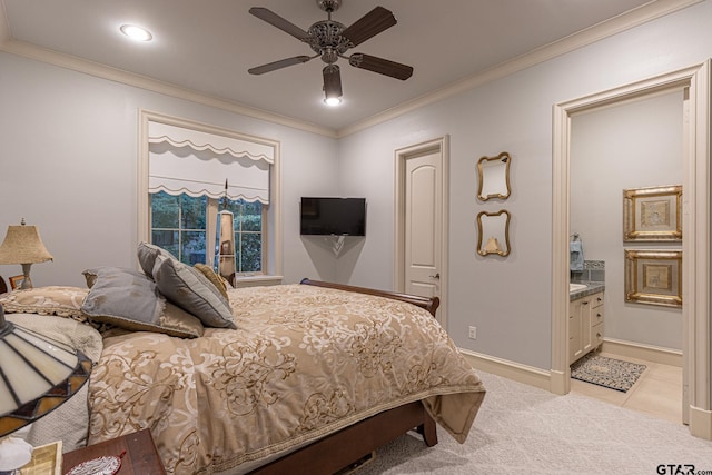 carpeted bedroom with ceiling fan, crown molding, and connected bathroom