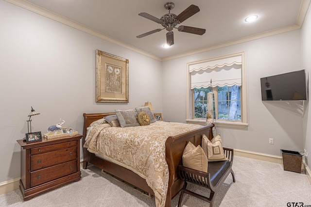 bedroom with ornamental molding, light colored carpet, and ceiling fan