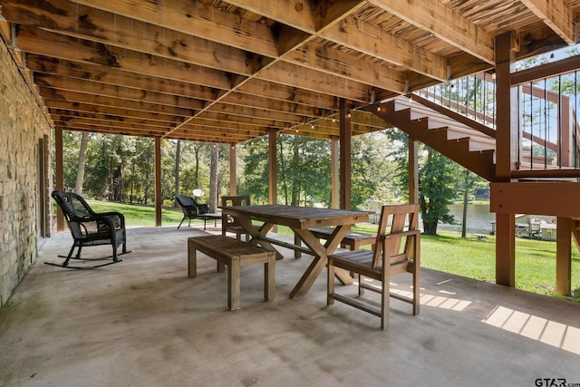 view of patio featuring a water view