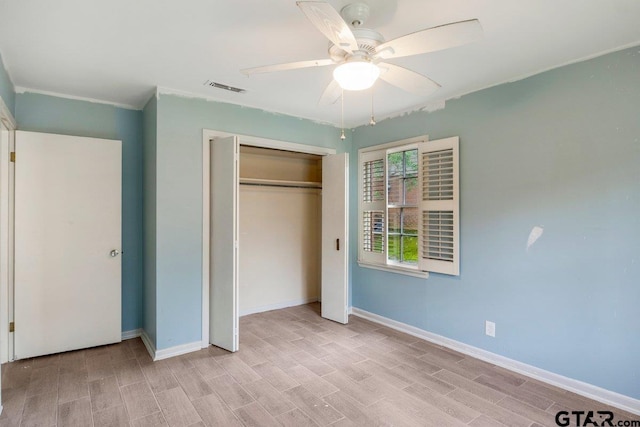 3316 Lynnwood Dr, Tyler, TX 75701 - unfurnished bedroom with a closet, wood finish floors, baseboards, and a ceiling fan