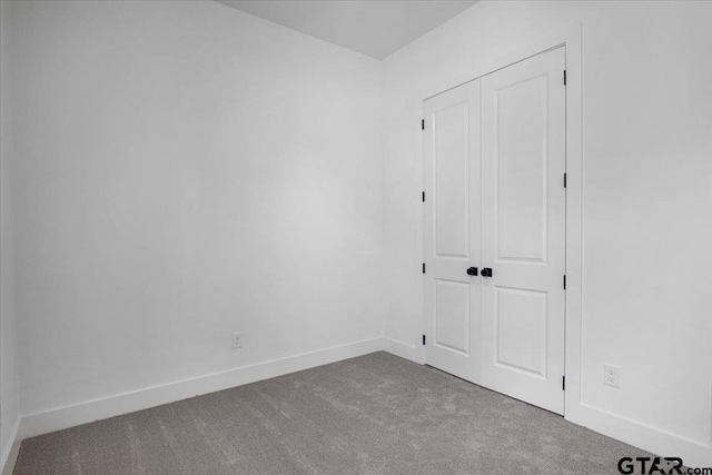 17314 Fm 2767, Tyler, TX 75705 - empty room featuring carpet and baseboards