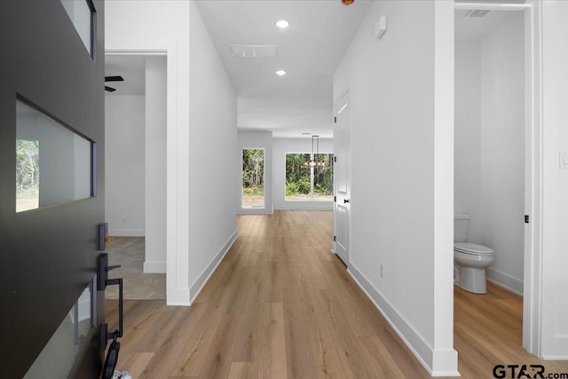 17314 Fm 2767, Tyler, TX 75705 - corridor with light wood finished floors, recessed lighting, and baseboards