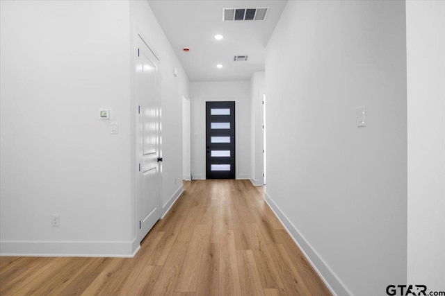 17314 Fm 2767, Tyler, TX 75705 - hall with light wood finished floors, baseboards, and recessed lighting