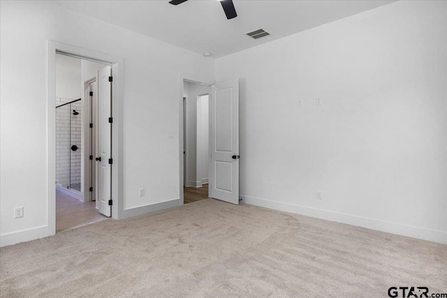 17314 Fm 2767, Tyler, TX 75705 - unfurnished bedroom with carpet floors, baseboards, a ceiling fan, and ensuite bathroom