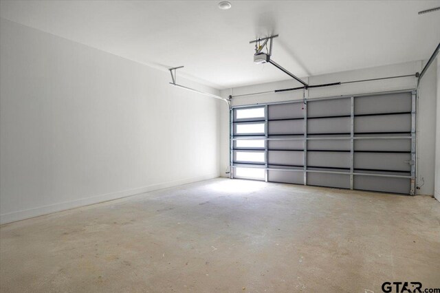 17314 Fm 2767, Tyler, TX 75705 - garage featuring a garage door opener
