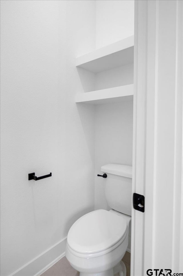 17314 Fm 2767, Tyler, TX 75705 - bathroom with baseboards and toilet