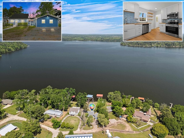 aerial view featuring a water view