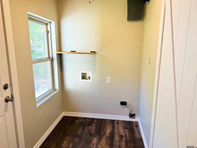 washroom featuring baseboards, laundry area, dark wood-style flooring, and washer hookup