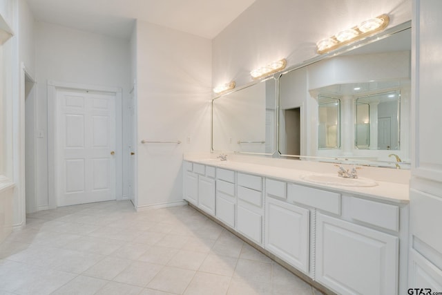 18737 Oakbrook Rd, Tyler, TX 75703 - full bathroom featuring double vanity, tile patterned floors, and a shower with shower door