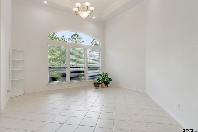 18737 Oakbrook Rd, Tyler, TX 75703 - empty room with a chandelier, ornamental molding, light tile patterned floors, a towering ceiling, and recessed lighting