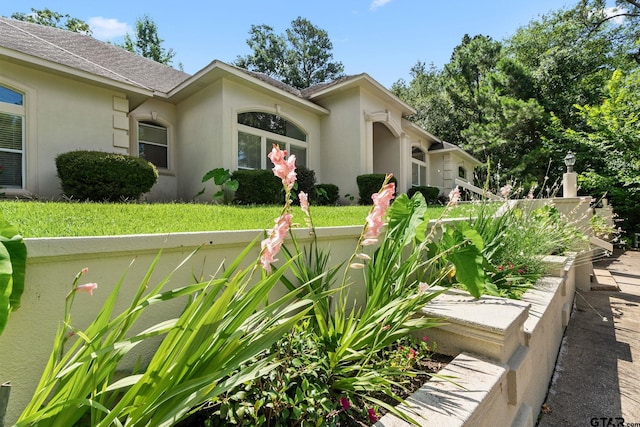 18737 Oakbrook Rd, Tyler, TX 75703 - view of front facade featuring stucco siding and roof with shingles