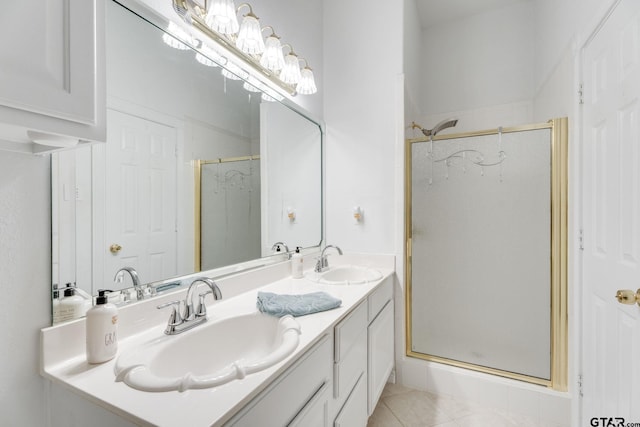 18737 Oakbrook Rd, Tyler, TX 75703 - full bathroom featuring a stall shower, double vanity, and tile patterned floors