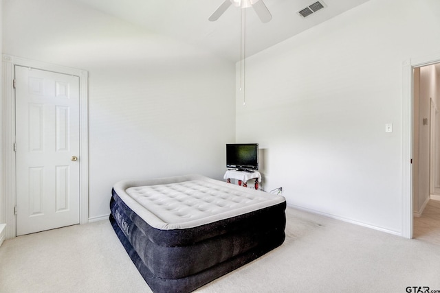 18737 Oakbrook Rd, Tyler, TX 75703 - bedroom with light colored carpet and a ceiling fan