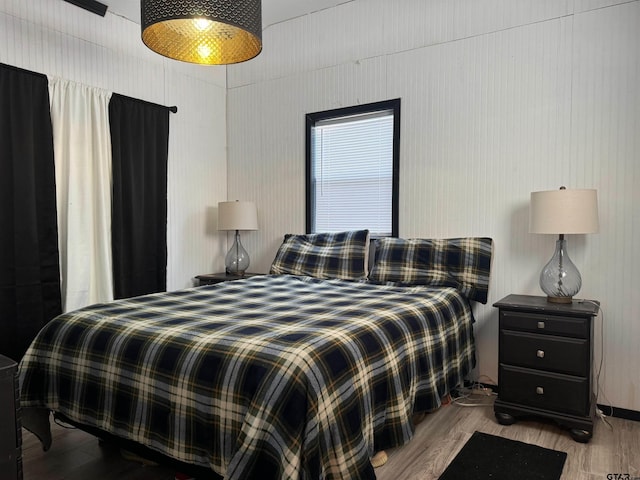 bedroom featuring light hardwood / wood-style floors