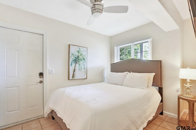 bedroom featuring ceiling fan and light tile patterned floors