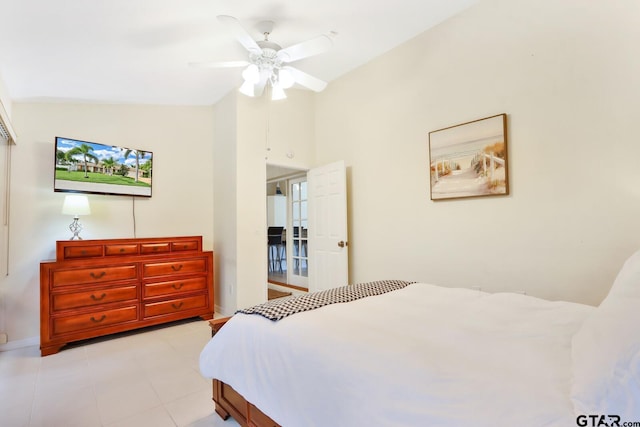 bedroom with ceiling fan and lofted ceiling