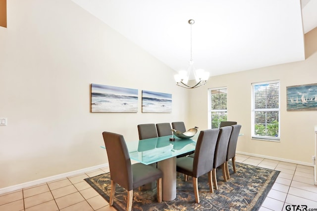 tiled dining room featuring vaulted ceiling and an inviting chandelier