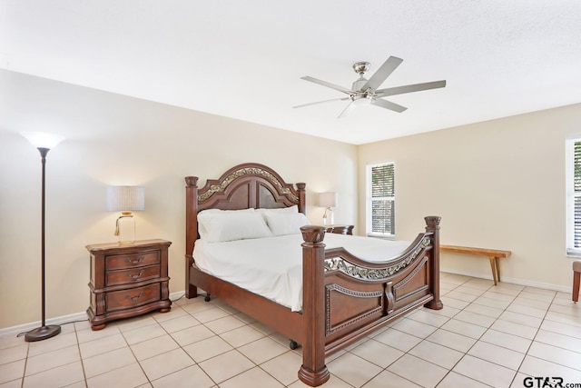 bedroom featuring ceiling fan and light tile patterned floors