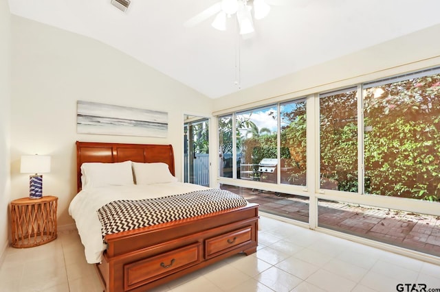 tiled bedroom with access to exterior, ceiling fan, and lofted ceiling