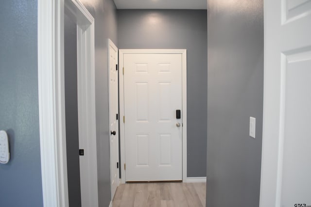 hallway featuring light hardwood / wood-style flooring