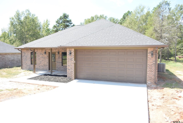 single story home featuring central AC unit