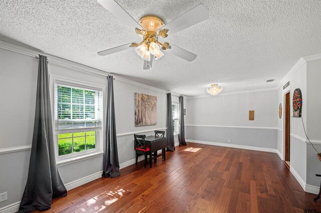 8312 Oxford Dr, Tyler, TX 75703 - spare room with a textured ceiling, ceiling fan, wood finished floors, and ornamental molding