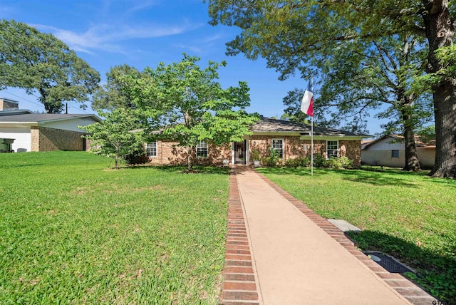 8312 Oxford Dr, Tyler, TX 75703 - view of front facade with a front lawn