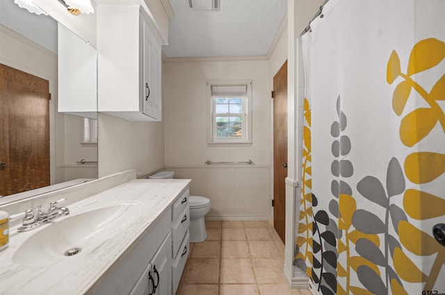 8312 Oxford Dr, Tyler, TX 75703 - bathroom featuring vanity, ornamental molding, a textured ceiling, and curtained shower