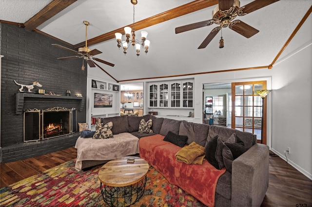 8312 Oxford Dr, Tyler, TX 75703 - living room with a ceiling fan, wood finished floors, a brick fireplace, and a chandelier