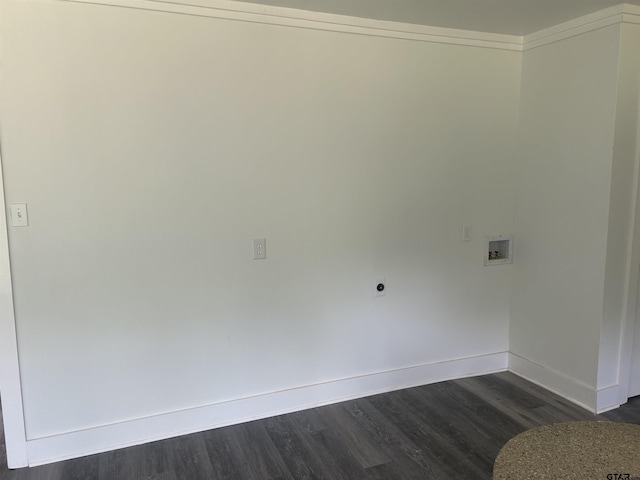 empty room featuring baseboards and dark wood-type flooring