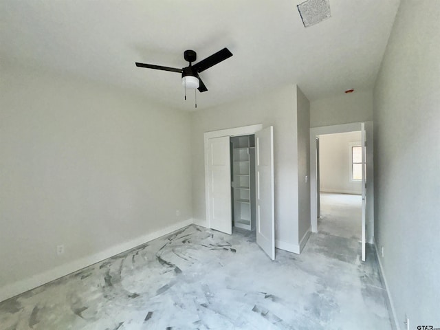 2514 N Glass, Tyler, TX 75702 - unfurnished bedroom with baseboards, a closet, and a ceiling fan